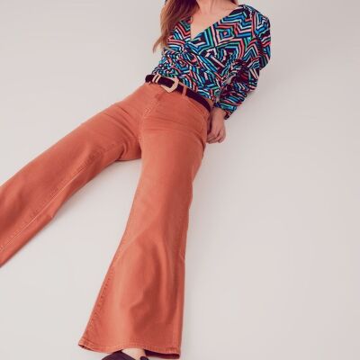 Jeans a gamba larga in misto cotone di colore arancione