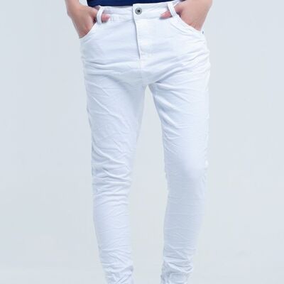 Crumpled white jeans with pockets