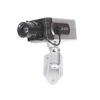 Motorized dummy camera on stand