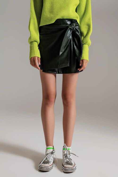 dark green faux leather mini skirt with bow on the side