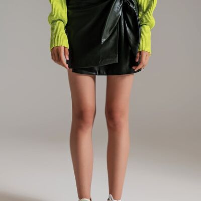 dark green faux leather mini skirt with bow on the side