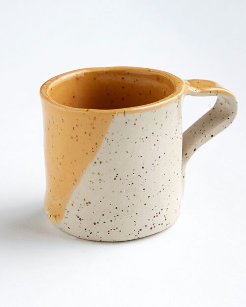 Handmade yellow ceramic mug