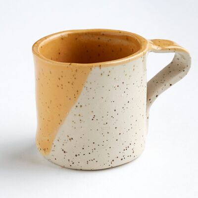 Handmade yellow ceramic mug
