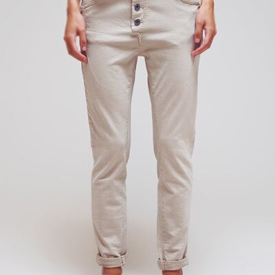 Exposed buttons skinny jeans in beige