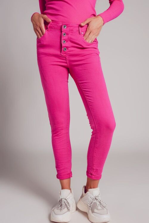 Exposed buttons skinny jeans in fuchsia