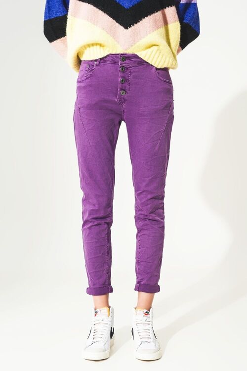 Exposed buttons skinny jeans in purple