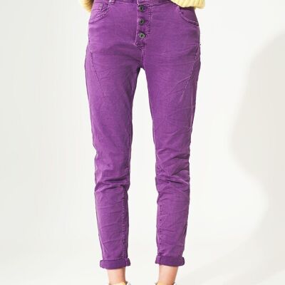 Jean skinny à boutons apparents violet