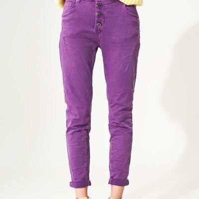Exposed buttons skinny jeans in purple