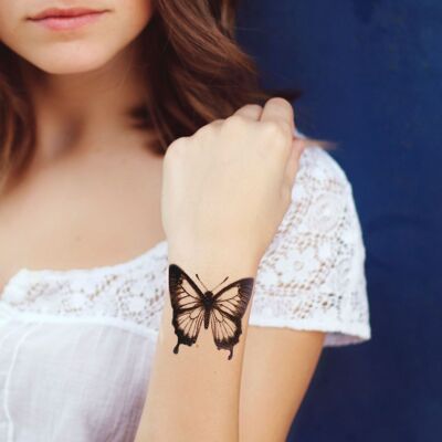 tatuaje temporal de mariposa vintage