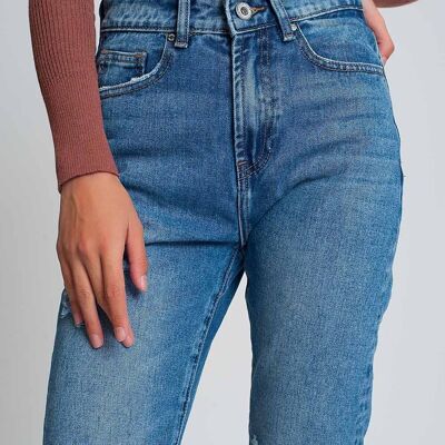 High waist mom jeans with ripped knees in dark wash blue