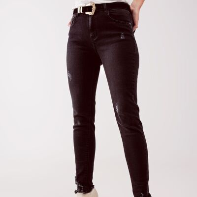 Jeans skinny strappati a vita alta neri
