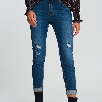 High waisted skinny jeans in dark wash blue with ripped details
