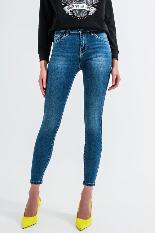 High waisted skinny jeans in mid blue