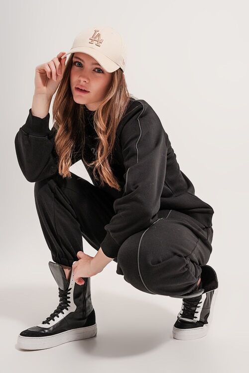 Joggers with drawstring waist and front seam in black