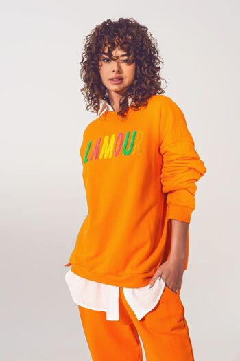 Pull L'amour Text en Orange 1