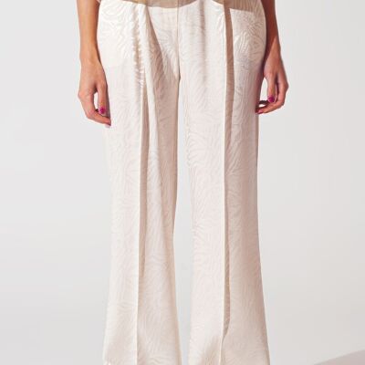 Pantalones holgados con estampado de cebra en blanco