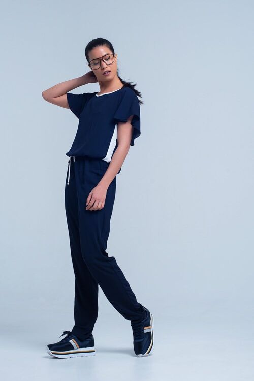 Navy blue jumpsuit with short sleeve and ruffle detail