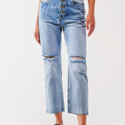 Sraight-leg jeans with exposed buttons and ripped knees in light wash