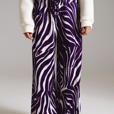 Pantaloni dritti con stampa zebrata in viola e bianco