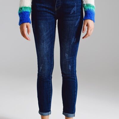 Jeans super skinny con abbottonatura frontale a vista a lavaggio medio