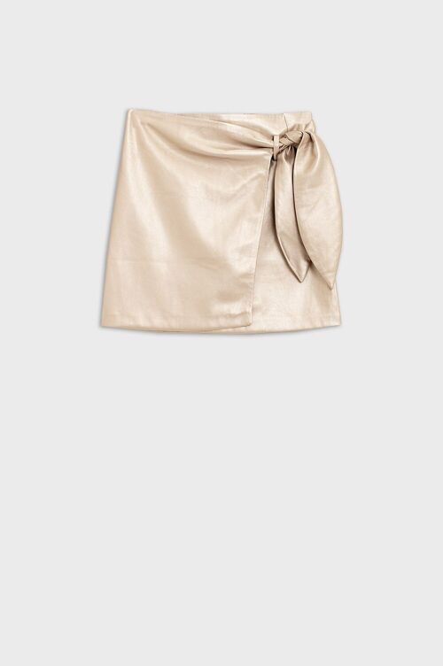 Gold faux leather mini skirt with bow on the side