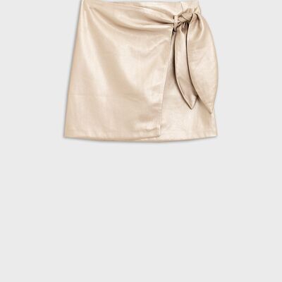 Gold faux leather mini skirt with bow on the side