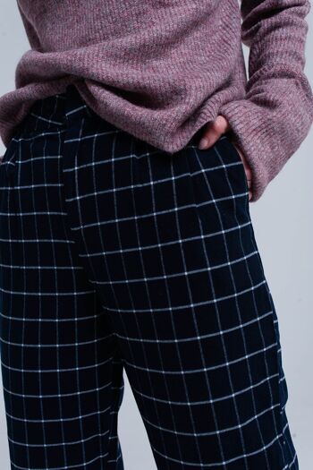 Pantalon bleu marine à imprimé tartan blanc 2