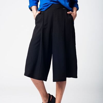 Black pants skirt with silver buttons