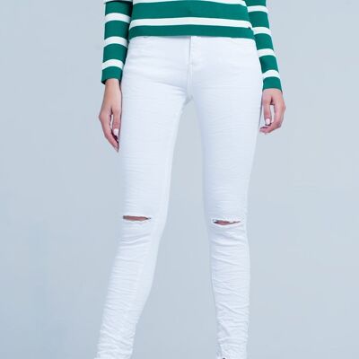 White skinny jeans with ripped knees detail