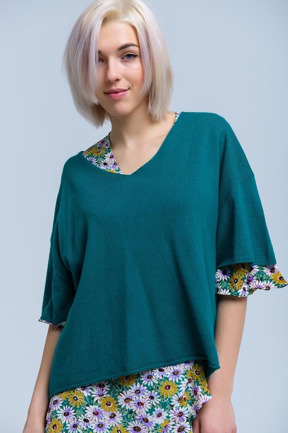 Maglione verde a maniche corte