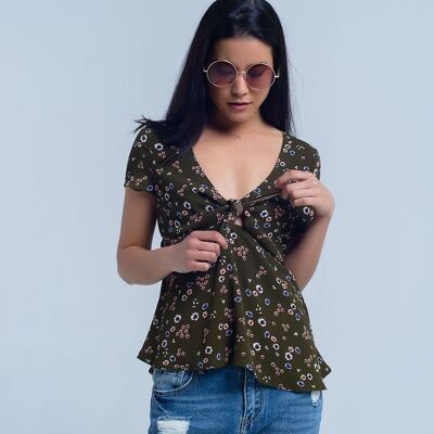 Green top with floral print