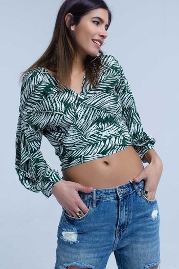 Blouse à imprimé feuilles vertes et décolleté plongeant 1