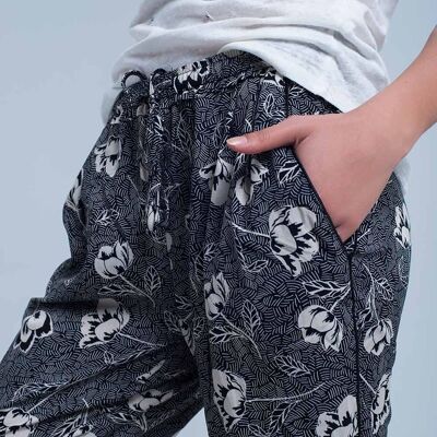 Black pants with floral print