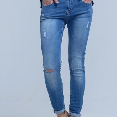 Skinny jeans with rips knee
