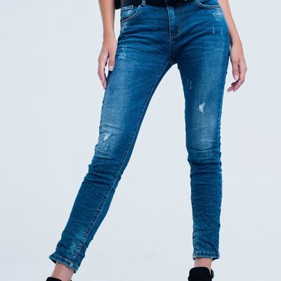 Jeans skinny blu con strappi