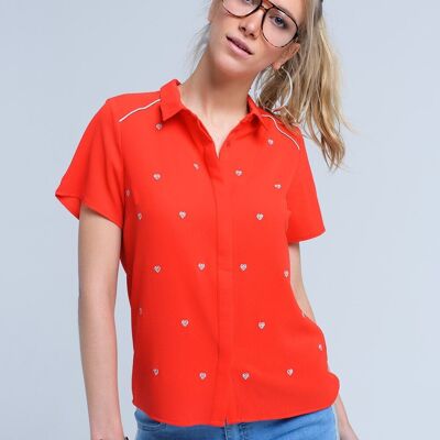 Red shirt with heart embroidery