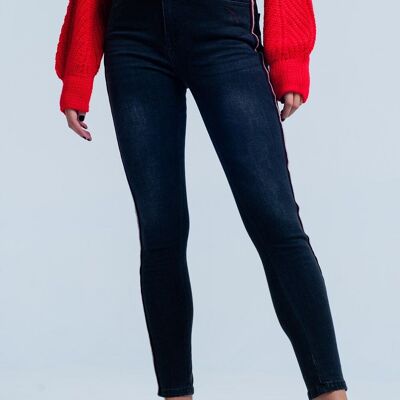 Jean skinny noir avec bande rouge sur le côté