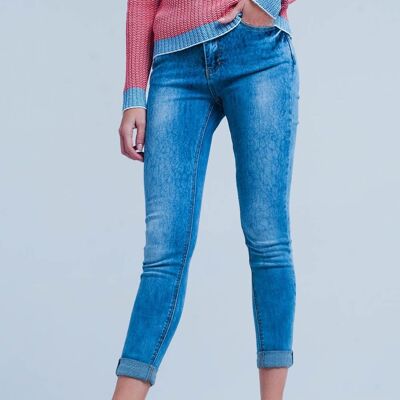 Medium wash skinny jeans with leopard print