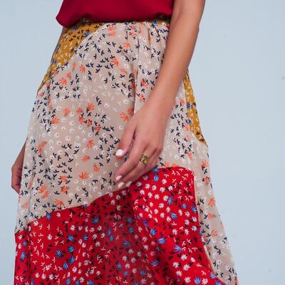 Falda midi con corte al bies y flores rojas