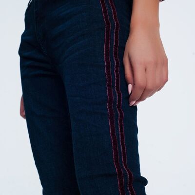 jeans skinny con strisce rosse sportive