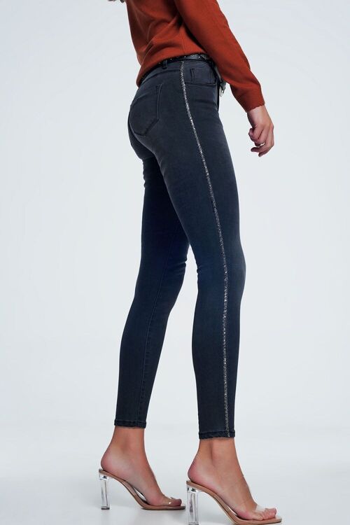 Black skinny jeans with shiny stones detail on the side