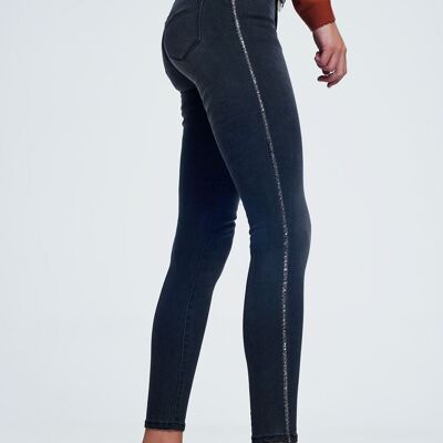 Black skinny jeans with shiny stones detail on the side