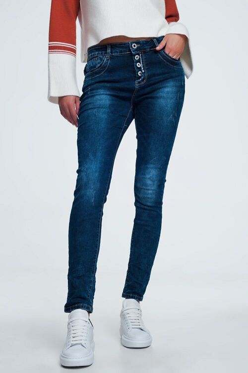 Blue jeans with button closure