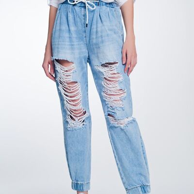 Heavily ripped boyfriend jeans in light denim