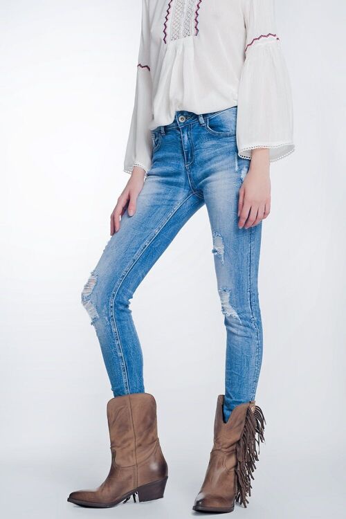 super skinny jeans in vintage mid wash blue with heavy rips