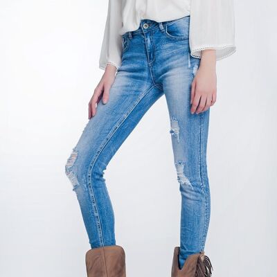 jeans super skinny in blu lavaggio medio vintage con strappi pesanti