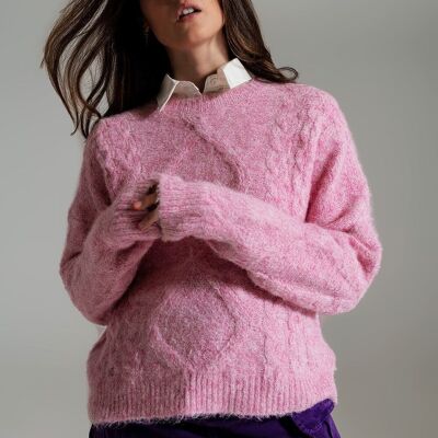 Pull en tricot torsadé en rose mélangé