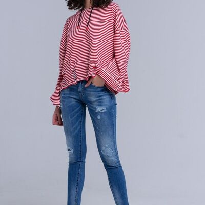 Distressed skinny jeans with fringes