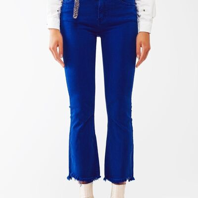 Jeans a zampa con bordo grezzo in blu