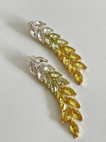Boucles d'oreilles pendantes longues avec feuilles de zircone rayonnantes : le summum du luxe 6